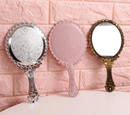 Haute définition à la main en verre rétro Modèle Vanité Mamorage éclairé miroir de style coréen princesse compacte Miroirs portables Handl2649472