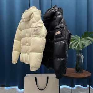 Versión de alta definición de la nueva chaqueta cálida y resistente al frío para hombres y mujeres de doble estándar 23 SS 70th Anniversary de Mengjia