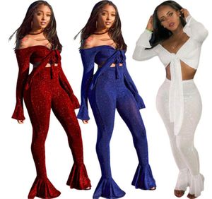 Hoge elastische herfst 2 -delige set v nek lange mouw vlinderdas crop top glanzende mager flare pant vrouwen kleding tweedelig sets 3409418