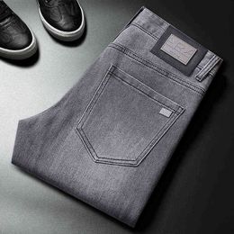Jeans gris américain haut de gamme marque de mode pour hommes à la mode et généreuse automne élastique Slim Fit lavage des petits pieds