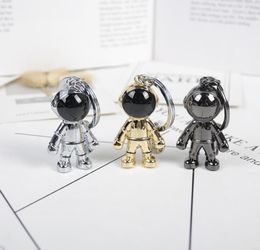 Designer haut de gamme dessin animé métal Spaceman charme porte-clés hommes femmes géométrique astronautes modèle porte-clés sac à dos voiture téléphone pendentif porte-clés bijoux