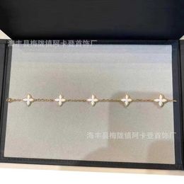 High-end ontwerper Vancleff vierbladige vijfblauwe armband vrouwelijke dubbelzijdige witte fritillaria 18K rose goud lockbone ketting