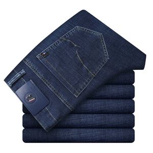 Haut de gamme marque de mode hommes d'affaires Jeans à la mode sauvage lâche droite pantalons décontractés printemps et été élastique Slim pantalon 210531