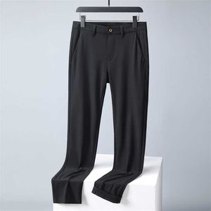 Pantalon de soie à glace haut de gamme pour hommes élasticité estivale mince version coréenne tendance polyvalente slim slim fit raide drapé décontracté