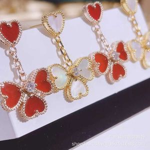 Hoogwaardige designer Hoge versie Fanjia Vierblad Grass Oorbellen voor dames nieuwe hartvormige liefde oorbellen 18k Rose Gold Heart Tassel oorbellen