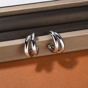 Boucles d'oreilles épaisses Double couche en métal de haute qualité, Surface brillante, clous d'oreilles pour femmes, boucles d'oreilles uniques personnalisées gracieuses et sauvages