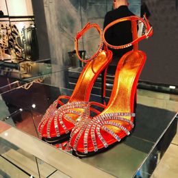 Sandalias Alevi O de tacón alto Tacones de carrete con correa con incrustaciones de cristal Tacón alto para mujer Diseñadores de verano Zapatos Zapatos de vestir de tacón de fiesta Calzado de fábrica