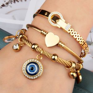 Hoge sieradenarmbanden en armbanden overdreven multi-stijl hangende kleine toetsen blauw oog roestvrijstalen gouden armband