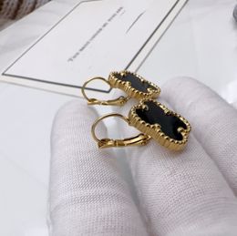 Alto pulido aro de flor grande cuelga letra de moda Stud Diseñador 18K oro rosa plata Hip Hop Pendiente para mujer Fiesta Boda círculo hueco Joyería al por mayor