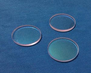 Hoge precisie 27941 mm lenzen cirkelvormige JGS1 kwarts beschermend raam glas filmplaat 1064nmar optische onderdelen voor lasermachine5633986