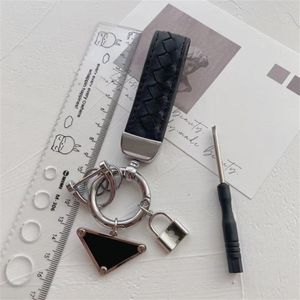 Haute qualité porte-clés lettres classiques noir blanc argent boucle porte-clés designers marque de luxe mode unisexe porte-clés porte-clés315r