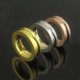 Anillo de pareja de acero de titanio 316L de alta calidad, anillo clásico de diseño de resorte de bobina única para mujeres y hombres, regalo de joyería de moda europea
