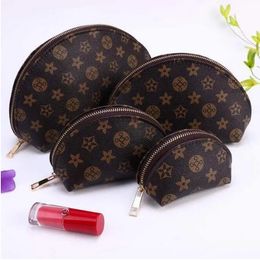 Haute qualité 4pcs / set designer marron femmes sacs à cosmétiques lettre organisateur maquillage pochette de voyage maquillage sac dames hommes sacs à main organisateur sacs de toilette paillettes2009