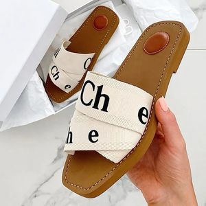 Designias zapatillas de diseño Sandalias de madera de tela Cartas de marca Sandalias planas de moda
