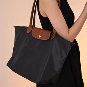 Sac de créateur de haute qualité hommes grand sac fourre-tout concepteur en cuir poignée supérieure extérieure pique-nique grande capacité sacoche nylon hasp saut de travail de travail fashion xb164 c4