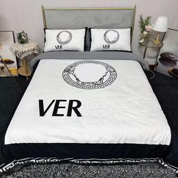Juegos de ropa de cama de diseñador de alta calidad 4pcs letras lavables impresas algodón gemelo cubierta de ropa de cama transpirable sábana de almohada de almohada