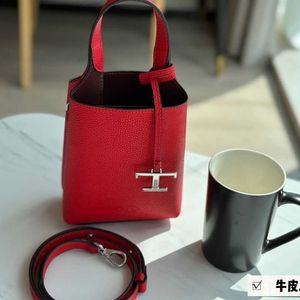 Hoogwaardige ontwerpers T Tijdloze schoudertassen Maat 15x16,5 cm Tod Milk Tea Bucket Bag is echt geurig kan worden gekruist of gedragen met lychee -patronen Handtas