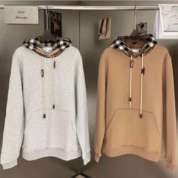 Hoge kwaliteit modetrend heren hoodie sweatshirt geruite trui met capuchon effen kleur patchwork casual trekkoord kangoeroezak damesjas