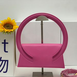 Haute qualité ja rond Sacs fourre-tout Sacs à main de vacances de fête Sac à bandoulière New Fashion pour femmes Sac à poignée circulaire lettre dorée portable sac à main dur de plage