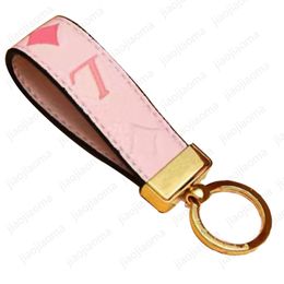 Hoge Kwaliteit Sleutelhanger Klassieke Prachtige Luxe Designer Auto Sleutelhanger schattig Merk Mode Vrouwen Mannen Zinklegering Brief Unisex Lanyard Goud Zwart Metalen accessoires 0019