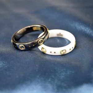 Bijoux de luxe de haute qualité et bague de Couple en céramique blanche et en acier noir, planète pâte frite, cadeaux nus pour petite amie