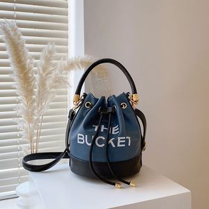 Haute qualité luxe le sac seau en cuir femmes hommes designer marc fourre-tout classique cordon épaule mode portefeuille seaux poignée supérieure sacs à main sac à main sac à bandoulière