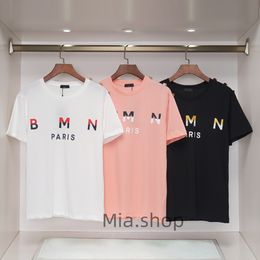 T-shirt pour hommes de haute qualité designer nouveau bouton en métal imprimé lettre à manches courtes demi-manches col rond hommes et femmes habillent les couples