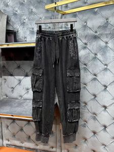 Hoge kwaliteit heren joggingbroek stijlvolle multi-pocket stiksel ontwerp zwarte cargo broek luxe designer broek