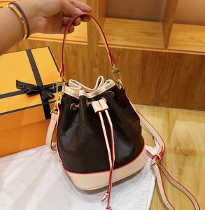 Hoogwaardige mini -bucket tas top luxe ontwerper crossbody schoudertassen handtas dames mode lederen handtassen handtas handtas groothandel verwijderbare schouders band