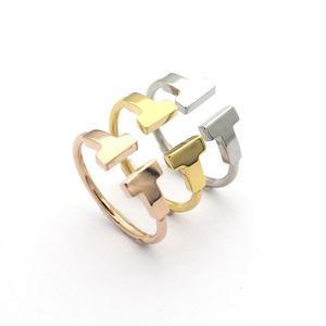 Haute qualité Nouveau Designer en forme de X en acier titane bague d'amour en argent croix entre diamants hommes et femmes bijoux en or rose couple bague cadeau avec boîte