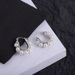 Boucles d'oreilles en perles incrustées géométriques en forme de U en argent de haute qualité pour femmes, mode personnalisée mini Hoop Huggie, cadeau de trajet