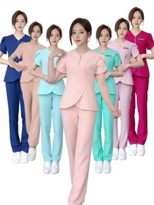 YL031 alta calidad especialmente belleza SPA salón mujeres usan elegantes trajes de matorral hospital uniforme pantalón trajes color sólido unisex operativo