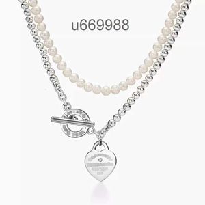 hoge kwaliteit T Populaire temperament 925 sterling zilveren OT gesp laag parel hartvormige hanger met diamanten halsketting voor vrouwen