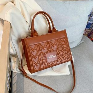 Sac fourre-tout de haute qualité Sac de créateur Sacs à bandoulière MJ Sacs à bandoulière Sac fourre-tout 2024 Nouveau style Sac à main Femmes Sacs Mode Sangles Portefeuille Top qualité