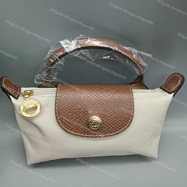 Bolsa al por mayor de alta calidad Cartera para mujer 2024 Estilo Un hombro Rayado Mini Dumpling Fresco Cambio de rayas Moda Móvil Bolsas de nylon Bolsos de diseñador Bolso Bolso