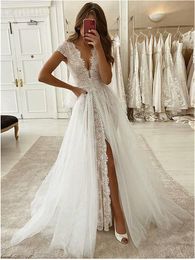Vestido de novia con escote en V profundo y abertura alta con sobrefalda, vestidos de novia de tul con encaje y manga casquillo, vestido de novia moderno y elegante
