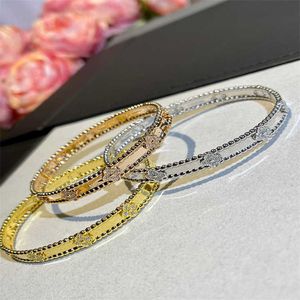 Hoog standaard armband geschenk eerste keuze zilver smal klein bloem modieus vier blad met gewone vanley armband