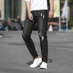 Zwarte High Street-broek, trendy nieuwe rechte geperforeerde jeans voor heren, lente en herfst