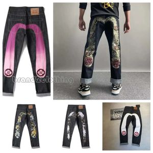 High Street Hip Hop Graffiti Print Jeans Pantalon à jambe droite mince de mode masculine