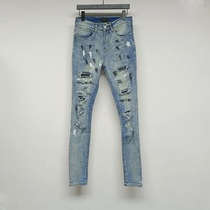 Jeans pour hommes de haute rue diamant moucheté trou d'encre jean épissage pantalon ajusté pieds élastiques pantalon en Denim noir