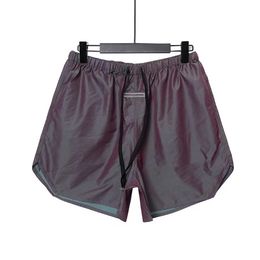Shorts pour hommes pantalons pantalons décontractés à lettres imprimées avec boucles lâches et courts réfléchissants d'été pour femmes hip-hop