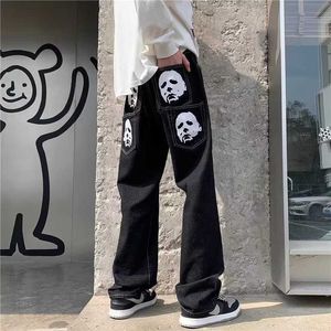 High Street Vibe Style Skull Head Imprimé Jeans Hip Hop Mens and Womens Drewing Jand Design Long Pantal
