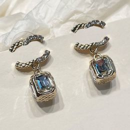 Pendientes de diseñador de marca de alto estilo Alas Cristal Letra Stud Chapado en oro Cobre Pendiente de plata Vogue Mujer Perla Gota para el oído Pendiente de diamante Joyería para fiesta de boda