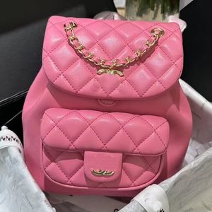 Fragancia pequeña de alto valor 23P bolso de diseñador de ranas bolso de manzana de gran capacidad bolso caviar cuero de vaca duma hombro estudiante mochila portátil de moda casual para mujeres todo-fósforo