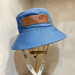 Haute designer chapeau lowe Nouvelle série Summer Ribbon Canvas Sunshade Hat Wide Brim Fisherman Star Same Blue Men's and Women's Style