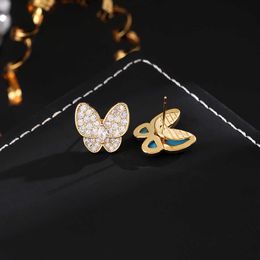 Tempérament polyvalent haut de gamme à la mode haut de gamme Boucles d'oreilles Van Butterfly Femmes Asymétriques Blue Email Full Diamond Bijoux
