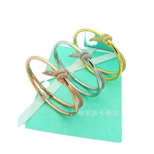 Hoge versie Seiko Knot -serie Bracelet vrouwelijk goud materiaalstar hetzelfde eenvoudige en royale twist -touw
