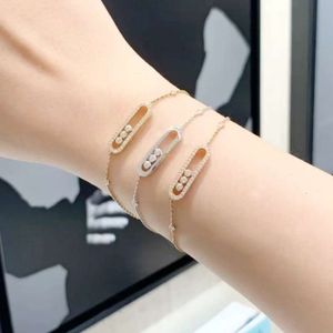 Version haute V Jinmei Famille Trois Bracelet glissant en diamant complet en or rose flexible Fily