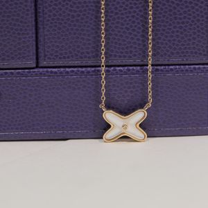 Hoge versie X-vormige diamanten ingelegde ketting, licht luxe V goud en wit Fritillaria amulet, gekruiste ketting, sleutelbeenketting
