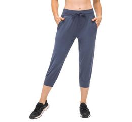 Leggings de cintura alta para mujer Pantalones de yoga L109 Bolsillos con cordón elástico Correr Fitness Ropa de gimnasio Entrenamiento Ejercicio Moda 5831311
